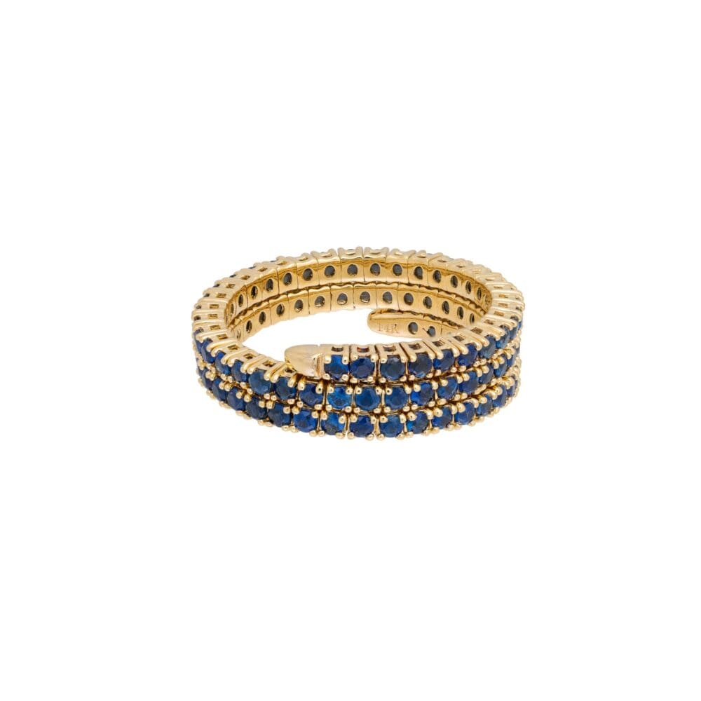 Blue Sapphire Triple Swirl Coil Eternity Ring Yellow Gold